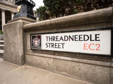 London, UK - A sign for Threadneedle Street, the location of the UK's Central Bank, the Bank of England, in London's traditional financial centre, the City of London.